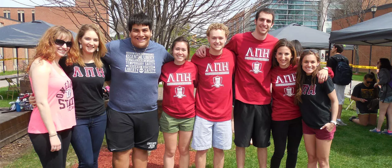 Lambda Pi Eta Students at "Fluffy Friends" event