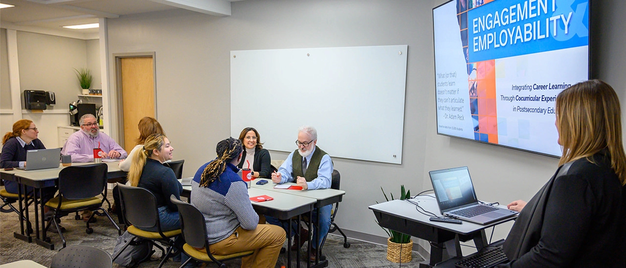 people in a workspace in downtown Oneonta