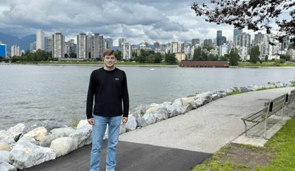 Ryan Baker with Whistler, BC skyline in the background