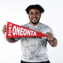 Juan Cirilo with Oneonta Banner