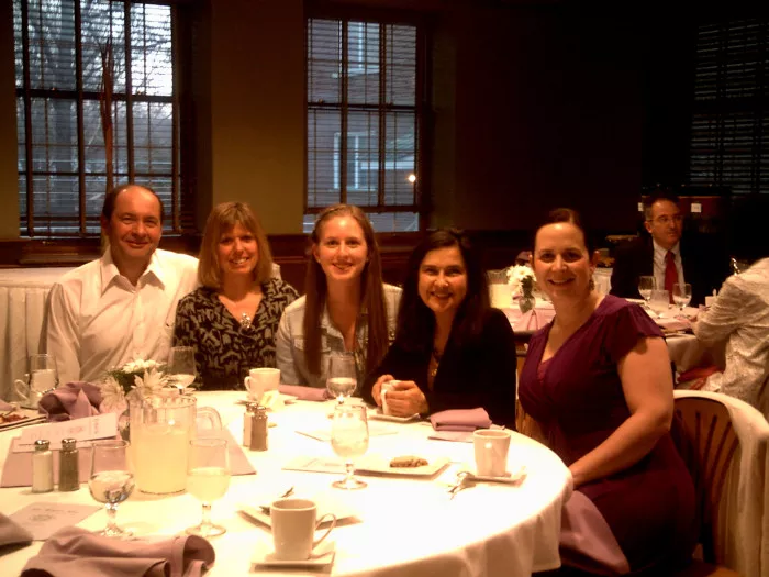 Professors Maria Cristina Montoya and Alejandra Escudero with parents at the honor society Banquet