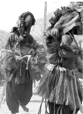 A mask dance celebration was provided for us by the Dogon.