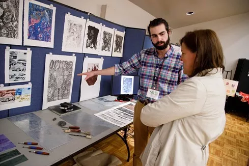 A SUNY Oneonta student presenting at the Student Research and Creative Activity Day