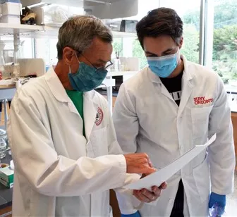 Assistant Professor Ron Bishop and student Nicholas Baker