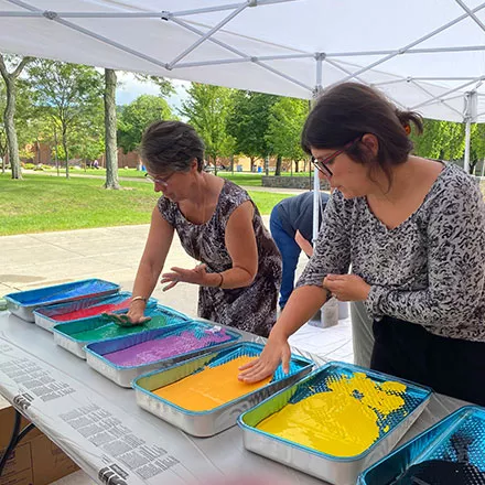 Faculty Place Hands on Wings