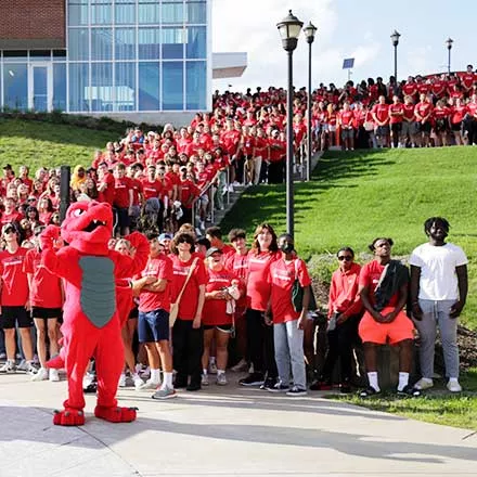 2027 class photo on the hillside overlooking the upper quad