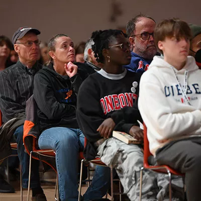 Students and faculty gather in Alumni Field House for Clint Smith Common Read Lecture