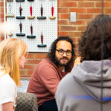 Natan talks with Interns in Fine Arts Studio