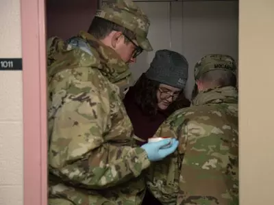 soldiers and students engaged in an exercise that took them out of a classroom