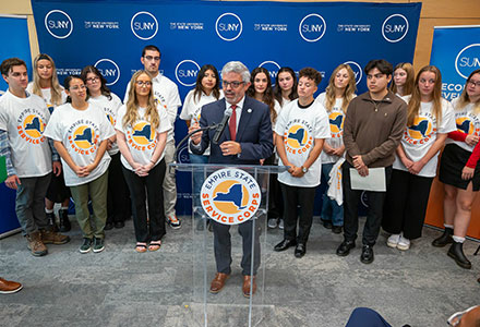 Dr Cardelle with service corp students
