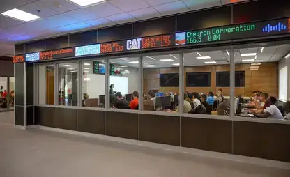 Stock ticker scrolls above the windows of the Bloomberg Room.