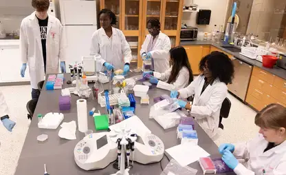 Chemistry students getting hands-on lab experience.