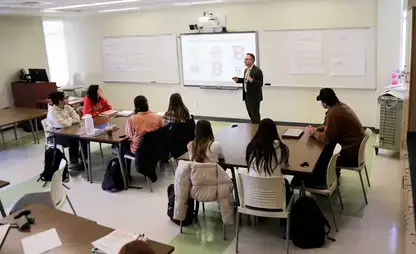 Students learning about adolescent education instruction.
