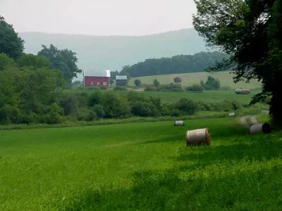 Thayer Farm at haying time, Getman Barn and Ice house in the background