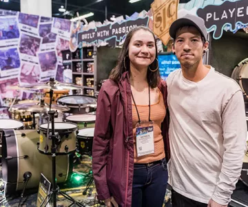 Oneonta student Kathryn Fernandez with 21 Pilots drummer Josh Dun