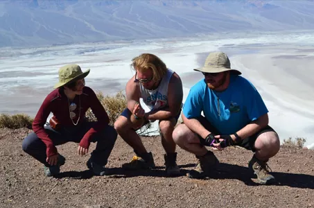 Students studying the rock formations in the Bad Lands